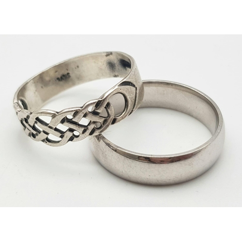 1310 - 2 X STERLING SILVER BAND RINGS, ONE PLAIN RING SIZE V & ONE CELTIC DESIGN RING SIZE W 8.6G