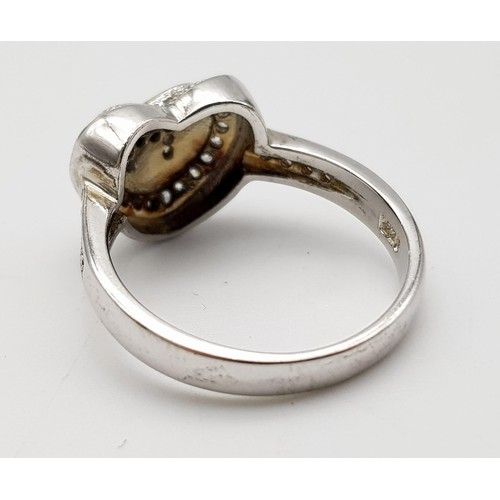 1275 - A STERLING SILVER STONE SET INITIAL H HEART RING 3.4G SIZE L

ref: SC 3151