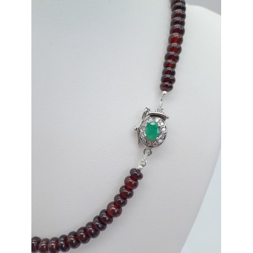 1521 - A 260ctw Garnet Rondelle Gemstone Necklace with Emerald Clasp - Set in 925 Silver. 44cm length. 53.5... 