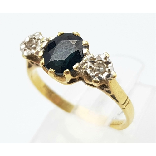 110 - A Vintage 18K Yellow Gold, Diamond and Sapphire Ring. Central round cut sapphire with a diamond eith... 