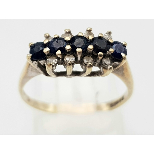 115 - A Vintage 9K Yellow Gold Diamond and Sapphire Ring. Four sapphires and eight small diamonds. Size K.... 