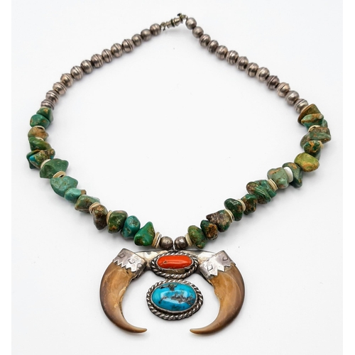 157 - A Vintage Native American Indian Silver and Kingman Turquoise Necklace - with Grizzly Bear claws, tu... 