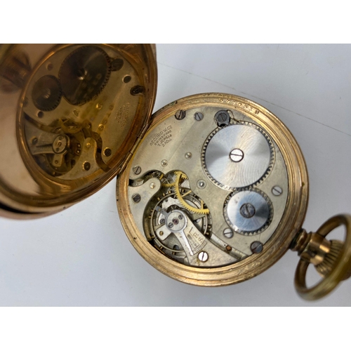 194 - An Antique Gold Plated Record Watch Company Pocket Watch. 7 jewels. Top Winder. White dial with seco... 