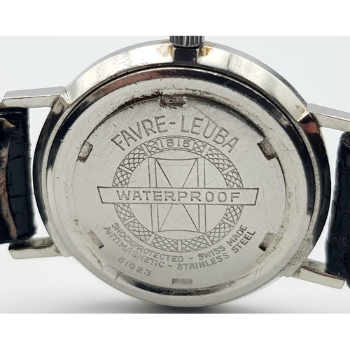 214 - A Vintage Favre-Leuba Mechanical Gents Watch. Black leather strap. Thin stainless steel case - 33mm.... 