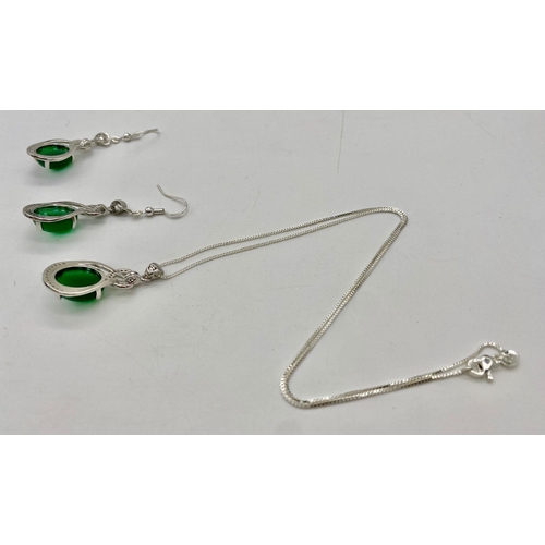 224 - A sterling silver chain necklace and earrings set with pendants adorned with IMPERIAL JADE cabochons... 