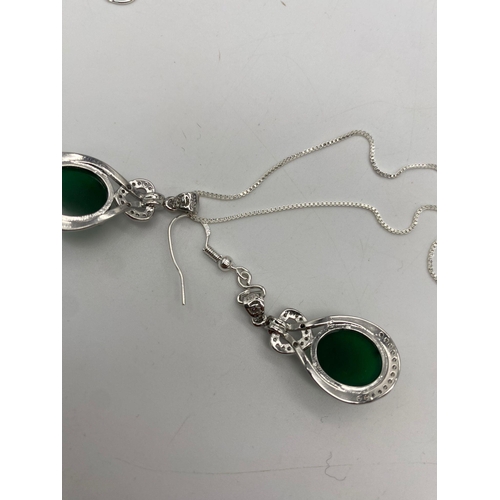 224 - A sterling silver chain necklace and earrings set with pendants adorned with IMPERIAL JADE cabochons... 