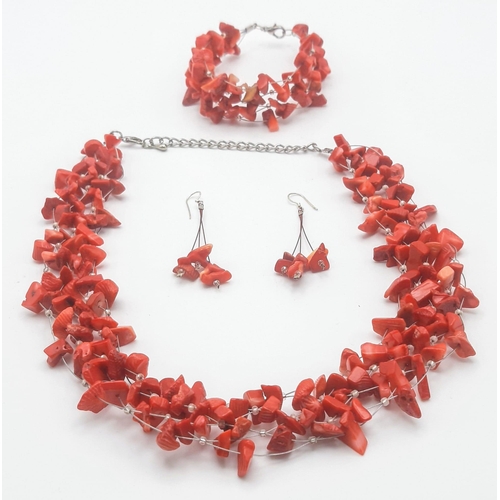 231 - An unusual Arabian Sea red coral necklace, bracelet and earrings set in a “Cloud” design, presented ... 