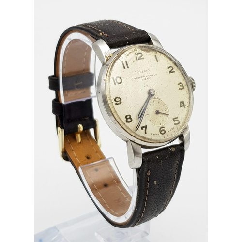 235 - A Rare Peerex Vintage Mechanical Gents Watch. Brown leather strap. Stainless steel case - 33mm. Nice... 