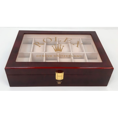 266 - A high-quality wooden watch case for 12 watches (often used by ROLEX and OMEGA dealers) made from hi... 