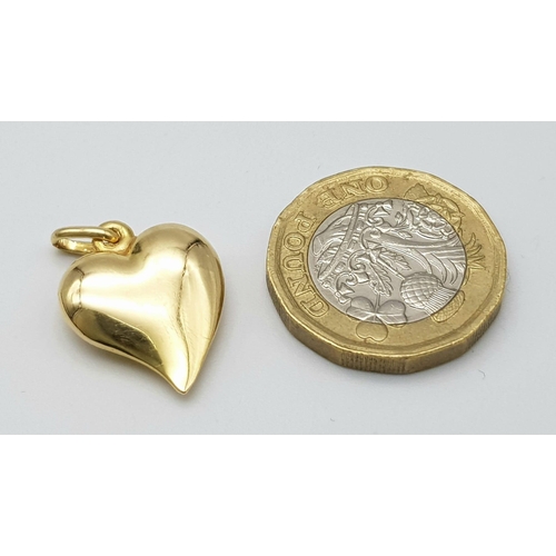 323 - An 18K Yellow Gold Heart Pendant/Charm. 2.5cm. 2.75g weight.