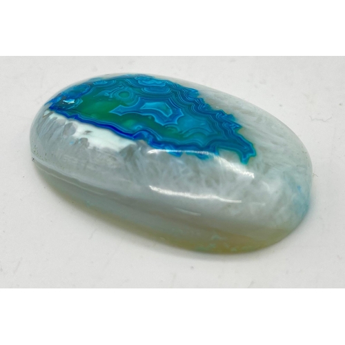 336 - A very rare marvel of nature, a BLUE BANDED AGATE surrounded by white agate. Oval shaped with dimens... 