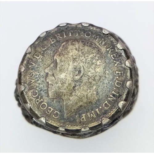 1314 - A vintage sterling silver Georgian coin ring with floral design on shoulder. Total weight 4.8G. Size... 