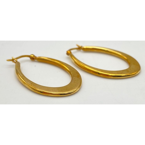 316 - A Pair of 9K Yellow Gold Horse-Shoe Hoop Earrings. 1.81g weight. 3.5cm drop.