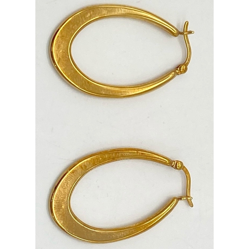 316 - A Pair of 9K Yellow Gold Horse-Shoe Hoop Earrings. 1.81g weight. 3.5cm drop.