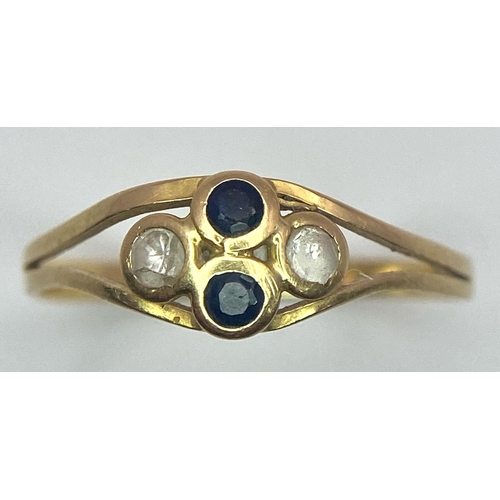 611 - An 18K Yellow Gold, Sapphire and White Stone Ring. Size Q. 1.23g total weight.