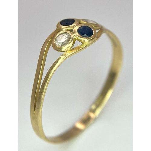 611 - An 18K Yellow Gold, Sapphire and White Stone Ring. Size Q. 1.23g total weight.