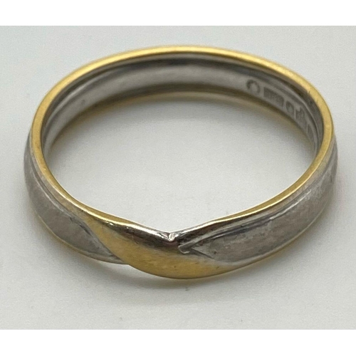 625 - An 18K White and Yellow Gold Crossover Band Ring. Size L. 3.4g weight.