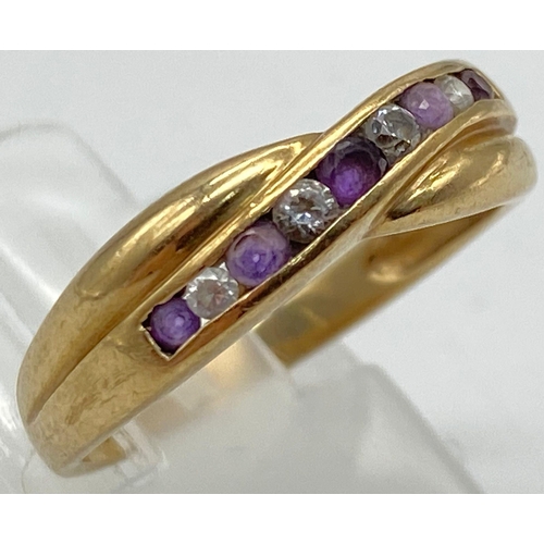 632 - A 9K Yellow Gold Ruby and White Zircon Ring. Size M. 1.9g total weight.