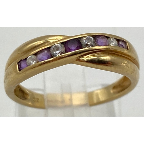 632 - A 9K Yellow Gold Ruby and White Zircon Ring. Size M. 1.9g total weight.