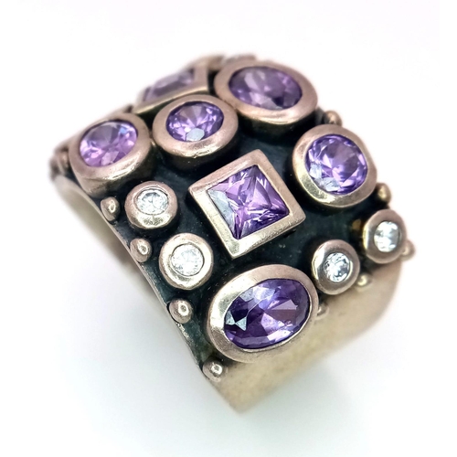 949 - A vintage 925 silver Amethyst and Zirconia stone set Gentlemen ring. Total weight 16.3G. Size R.