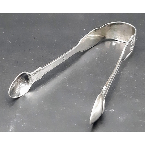 1145 - An antique Georgian sterling silver sugar tongs. Full hallmarks London, 1824. Total weight 52.6G. To... 