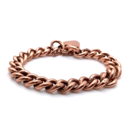 173 - A Vintage 9K Rose Gold Curb Link Bracelet with Heart Clasp. 
18cm. 17.21g weight.