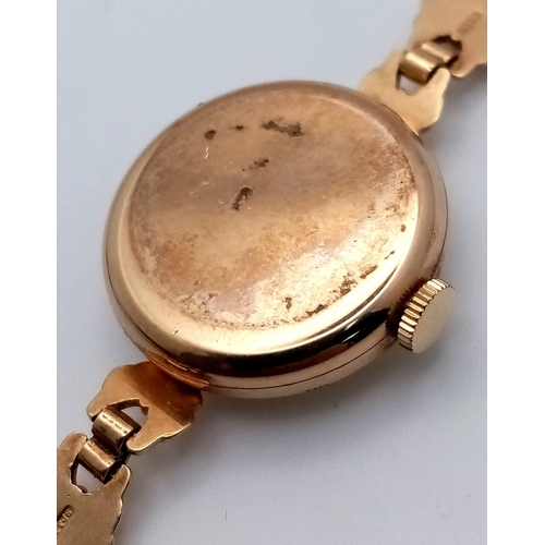 199 - A Lovely Vintage Rotary 9K Gold Ladies Watch. 9K gold bracelet and case - 20mm. White dial. Mechanic... 