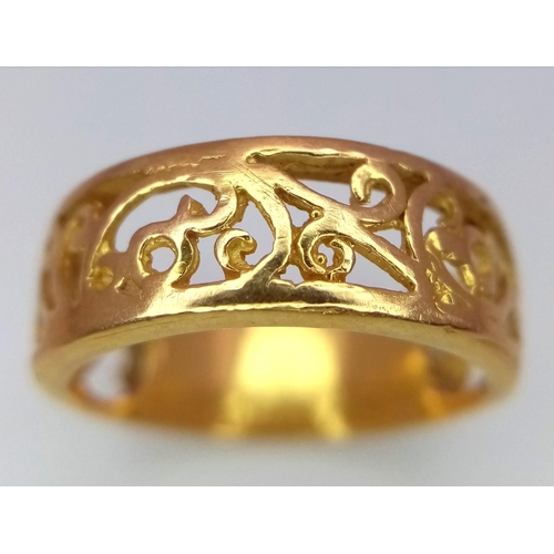 470 - A 22K Yellow Gold (tested) Pierced Band Ring. Size K. 3.75g weight.