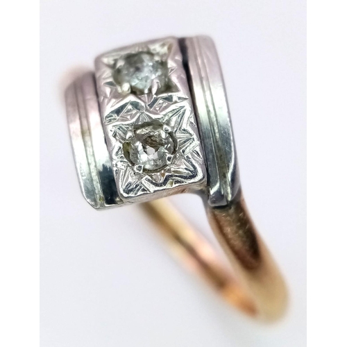 526 - A Vintage 9K Yellow Gold Crossover Diamond Ring. Size N. 3g total weight.