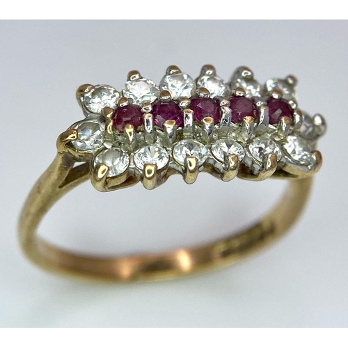 58 - A Vintage 9K Yellow Gold Ruby and Diamond Ring. Five rubies with a twelve diamond surround. Size J. ... 