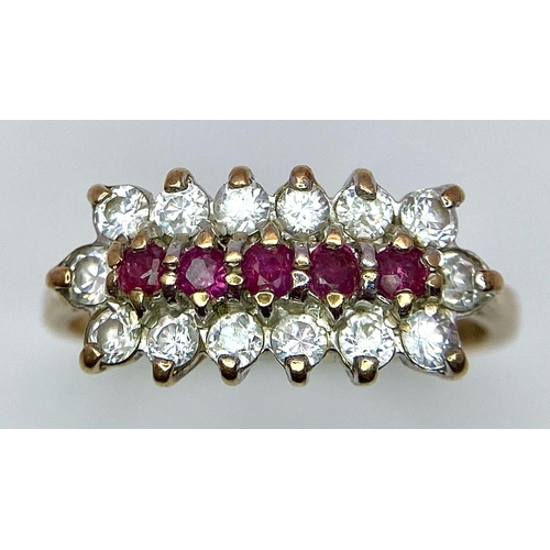 58 - A Vintage 9K Yellow Gold Ruby and Diamond Ring. Five rubies with a twelve diamond surround. Size J. ... 