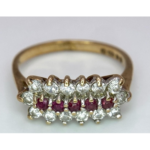 58 - A Vintage 9K Yellow Gold Ruby and Diamond Ring. Five rubies with a twelve diamond surround. Size J. ... 