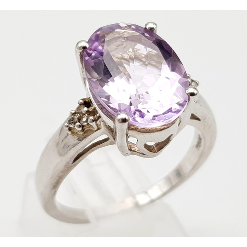 1312 - Large faceted amethyst silver cocktail ring, weight 5.2g size R, marked TGGC