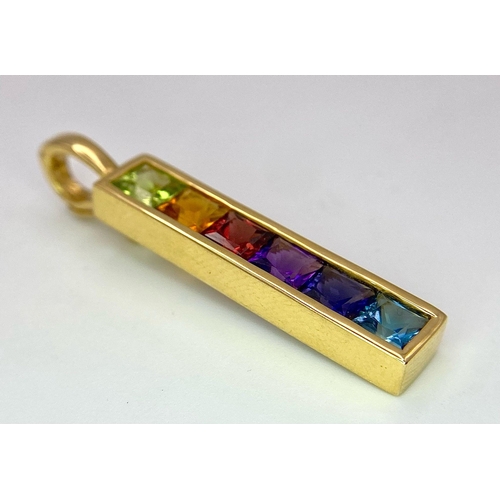 561 - An 18K Yellow Gold Multi-Gemstone Bar Brooch. Peridot, Citrine, Ruby, amethyst, sapphire and topaz! ... 