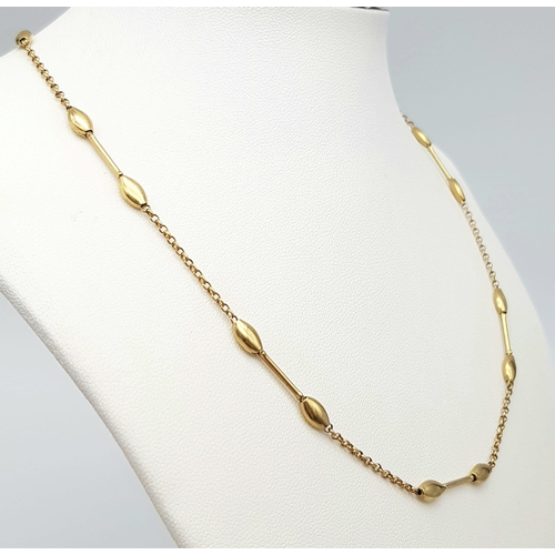 568 - A 9K Yellow Gold Bar and Oval Link Necklace. 42cm. 5.25g weight.