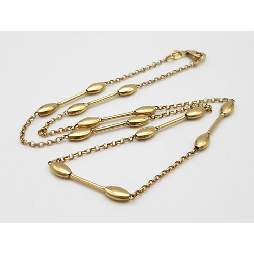 568 - A 9K Yellow Gold Bar and Oval Link Necklace. 42cm. 5.25g weight.