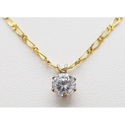 633 - A 9K Yellow Gold Flat Oval Link Necklace with a Bright White CZ Pendant. 44cm necklace length. 4.1g ... 