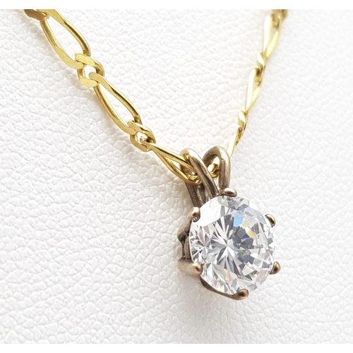 633 - A 9K Yellow Gold Flat Oval Link Necklace with a Bright White CZ Pendant. 44cm necklace length. 4.1g ... 