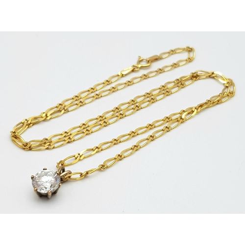 633 - A 9K Yellow Gold Flat Oval Link Necklace with a Bright White CZ Pendant. 44cm necklace length. 4.1g ... 