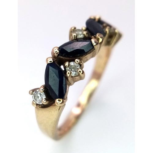 911 - A Vintage 9K Yellow Gold Sapphire and White Stone Ring. Size O. 3.2g total weight.