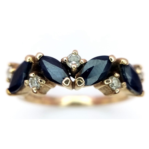 911 - A Vintage 9K Yellow Gold Sapphire and White Stone Ring. Size O. 3.2g total weight.