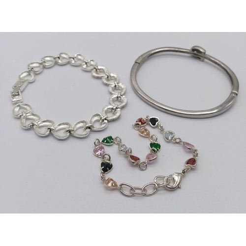 1138 - A collection of 2 fashion stone set bracelets and 1 bangle. Please see photos for details