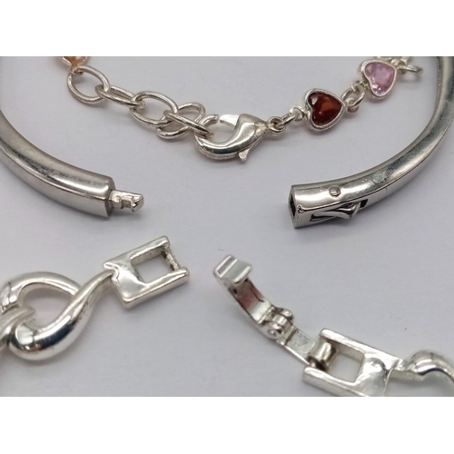 1138 - A collection of 2 fashion stone set bracelets and 1 bangle. Please see photos for details