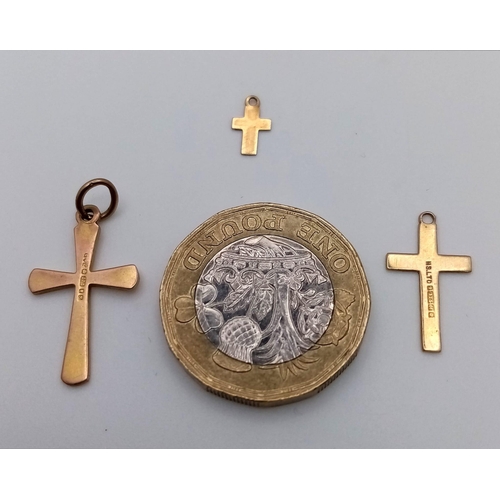 1369 - Three 9K Gold Different Size Cross Pendants. Largest cross 30 x 15mm. 1.16g total weight.