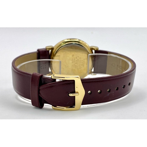 1472 - A Citizen Quartz Moonphase Unisex Watch. Burgundy leather strap. Gilded case - 33mm. In working orde... 