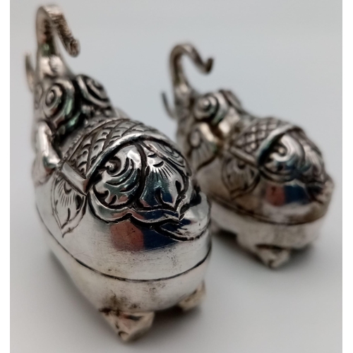 333 - A pair of antique Cambodian silver elephant betel nut boxes. Made in the traditional Khmer silver wo... 