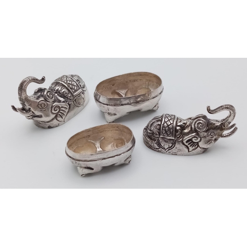 333 - A pair of antique Cambodian silver elephant betel nut boxes. Made in the traditional Khmer silver wo... 