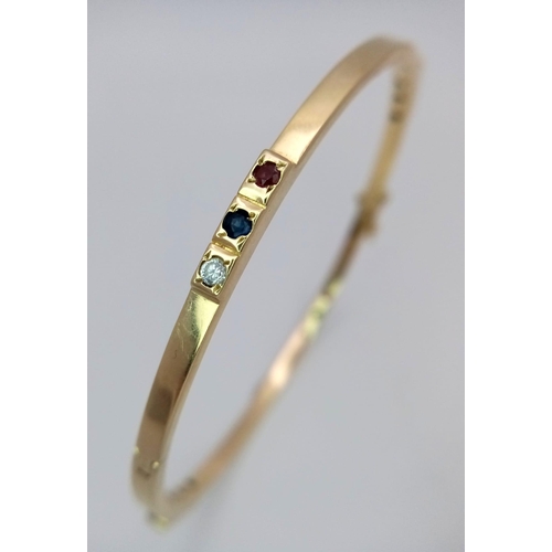 345 - An 18K Yellow Gold (tested) Multi-Gemstone Bangle. Clip open design. 63mm inner diameter. 10.83g wei... 