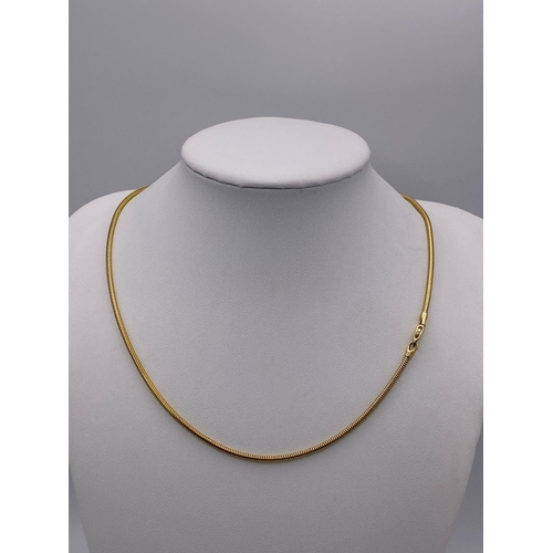 358 - An 18K Yellow Gold (tested) Snake Link Necklace. 41cm. 11.62g weight.