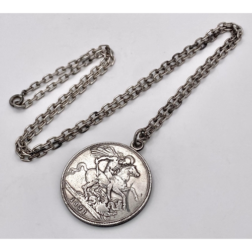 359 - An 1891 Queen Victoria Silver Crown in a Pendant Setting on a Sterling Silver Chain. 41.21g total we... 